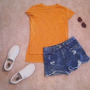 Cute yellow tee, has shirt pocket on left side